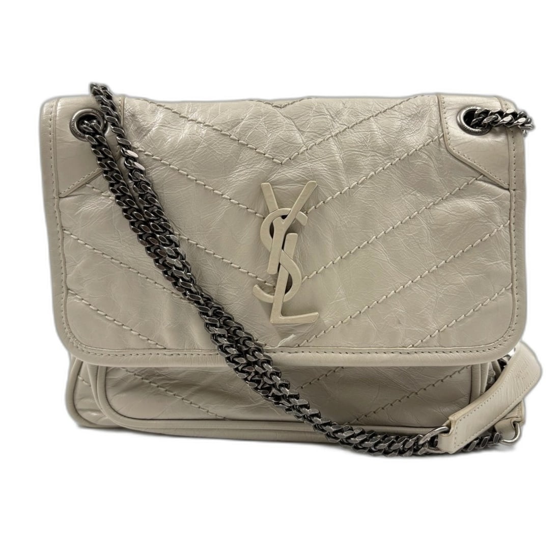 YVES SAINT LAURENT Niki Baby Handbag Shoulder Bag Beige: --- Catalog ---Category: SizeSize (HxWxD): 18cm x 23cm x 7cm / 7.08'' x 9.05'' x 2.75''Category: DesignType: Handbag, Shoulder bagColor: BeigeGender: WomenCategory: GeneralBrand: Yves Saint Laurent---