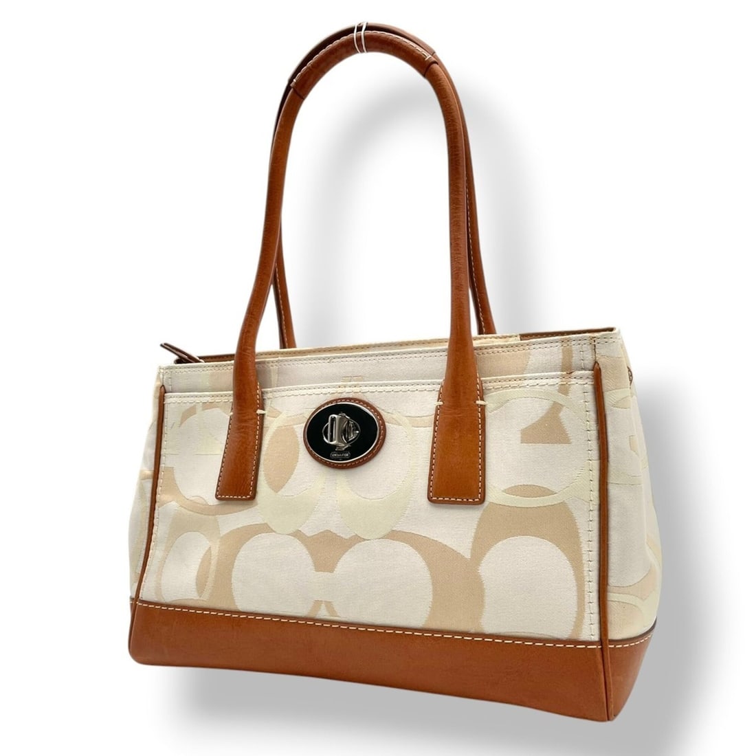 Coach Madeline Optic Signature Tote Bag, Handbag, Shoulder Canvas and Leather, Ivory Camel Brown,: --- Catalog ---Category: SizeSize (HxWxD): 20cm x 34cm x 12cm / 7.87'' x 13.38'' x 4.72''Category: DesignType: Handbag, Tote bagColor: IvoryGender: WomenMaterial: Canvas , Leather Category: GeneralMPN
