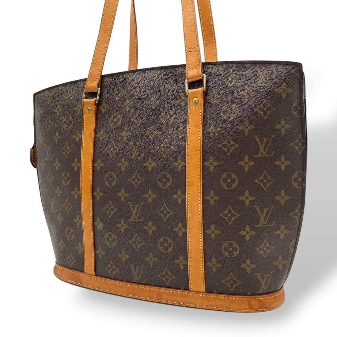 LOUIS VUITTON Babylon Monogram Tote Bag Shoulder Leather Brown Gold Hardware M51102 E16: --- Catalog ---Category: SizeSize (HxWxD): 31cm x 41cm x 11cm / 12.2'' x 16.14'' x 4.33''Category: DesignType: Shoulder bag, Tote bagColor: BrownGender: WomenMaterial: PVC , Leather Category: