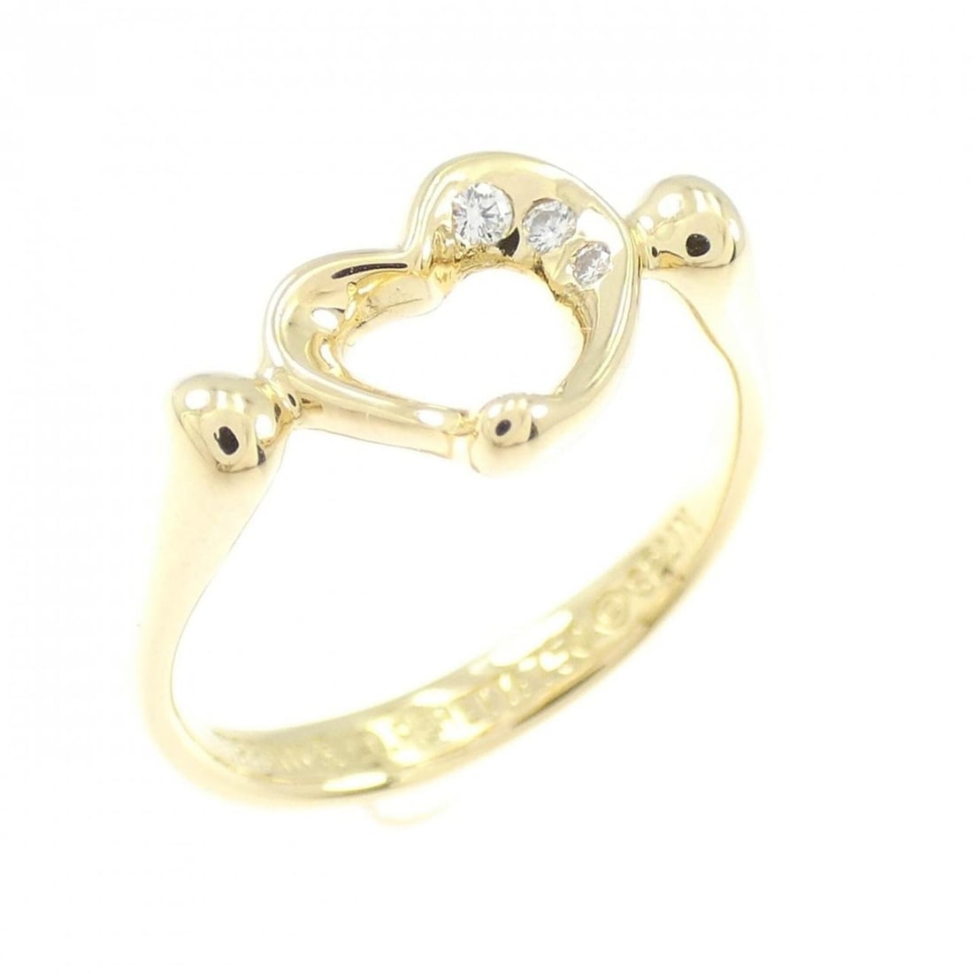 Tiffany Open Heart Ring: --- Catalog ---Category: SizeJP Size: 9.5US Size: 5Category: DesignType: Band ringGender: WomenMaterial: Yellow gold (18K)Category: GeneralBrand: Tiffany--- Item List ---Section: ConditionRanking: