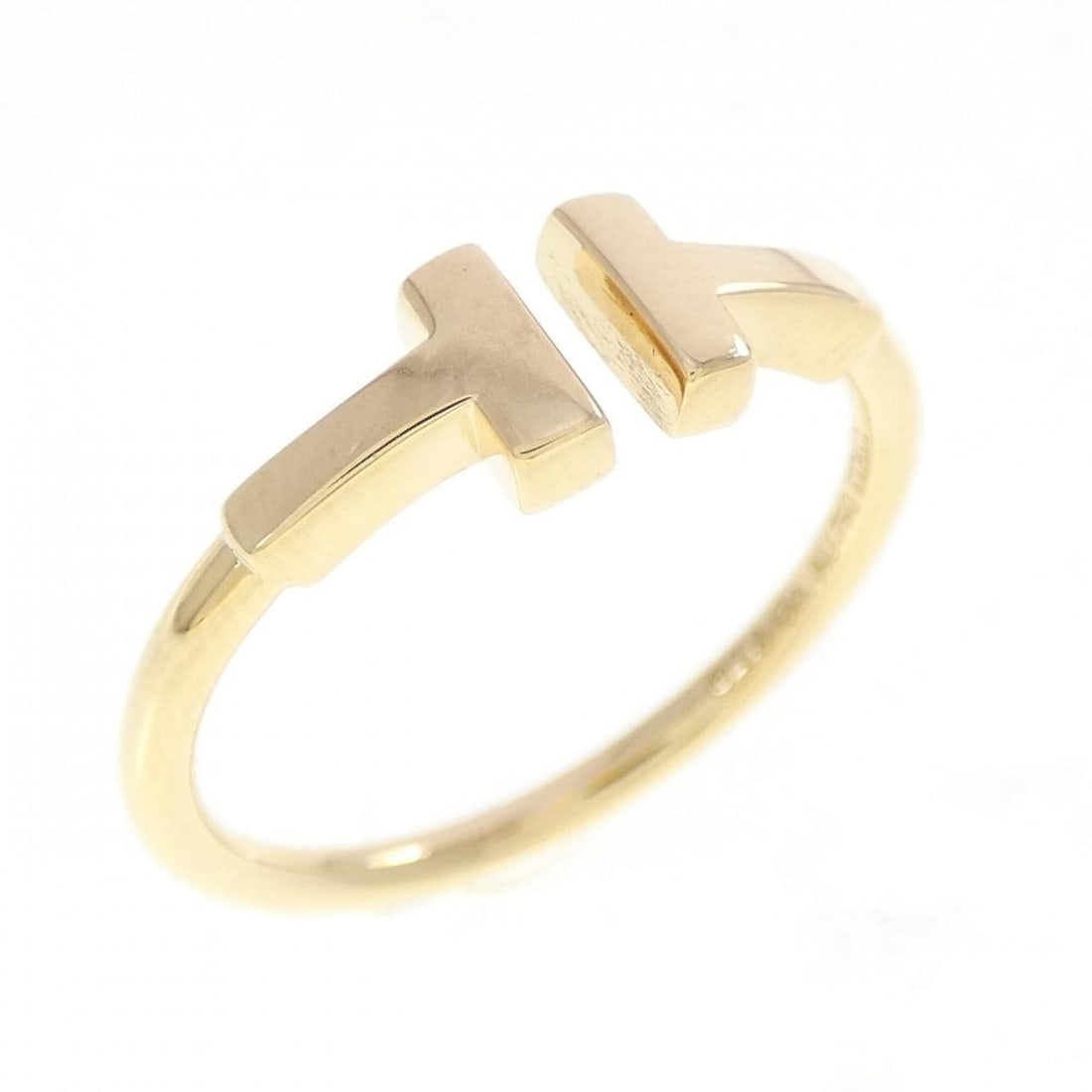 Tiffany T Wire Ring: --- Catalog ---Category: SizeJP Size: 14US Size: 7Category: DesignType: Band ringGender: WomenMaterial: Yellow gold (18K)Category: GeneralBrand: Tiffany--- Item List ---Section: ConditionRanking: