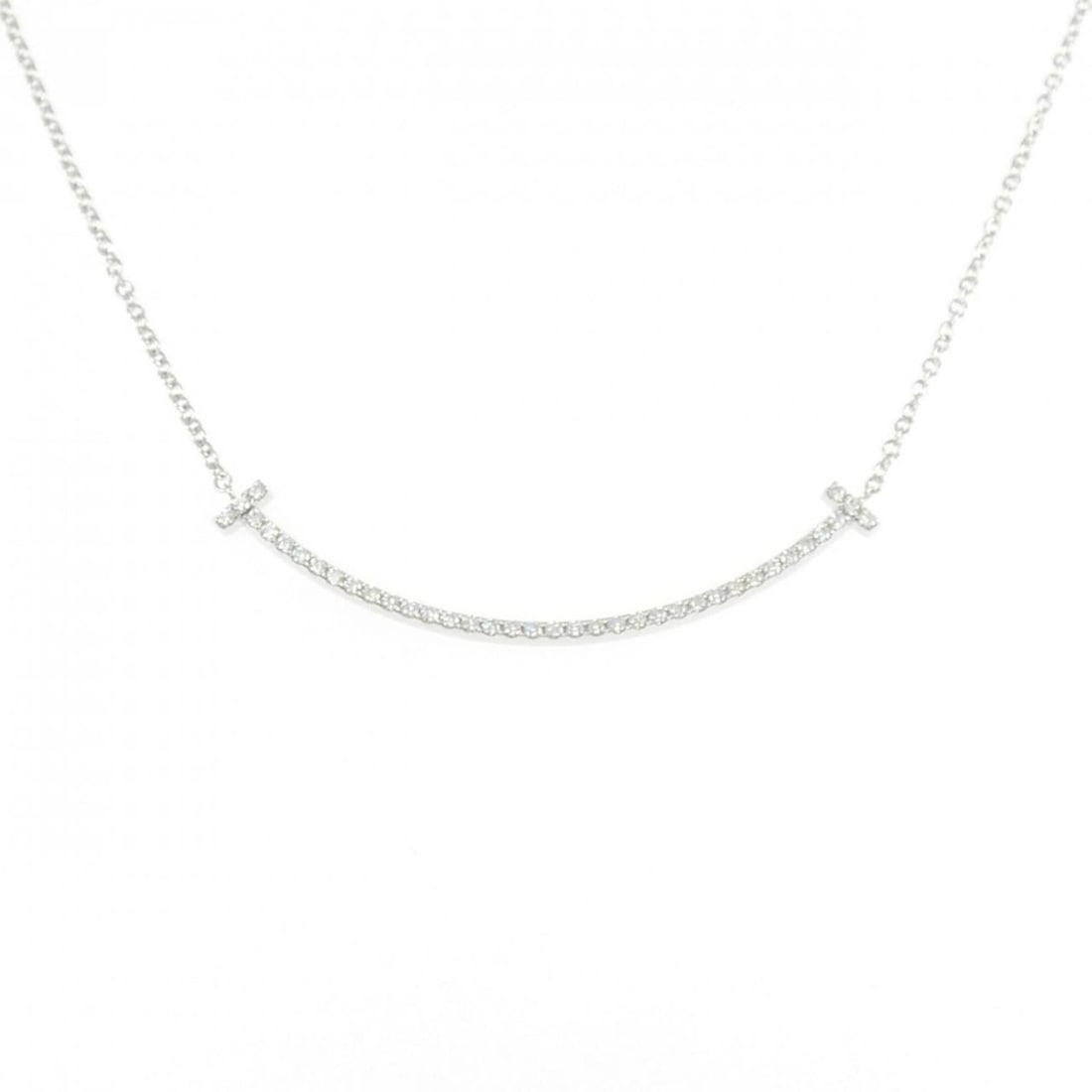 Tiffany T Smile Small Necklace: --- Catalog ---Category: SizePendant Size: 3.6mm x 37mm / 0.14'' x 1.45''Neck Circumference: 40 cm / 15.74''Category: DesignGender: WomenMaterial: White gold (18K)Pendant Type: PendantNecklace Type: