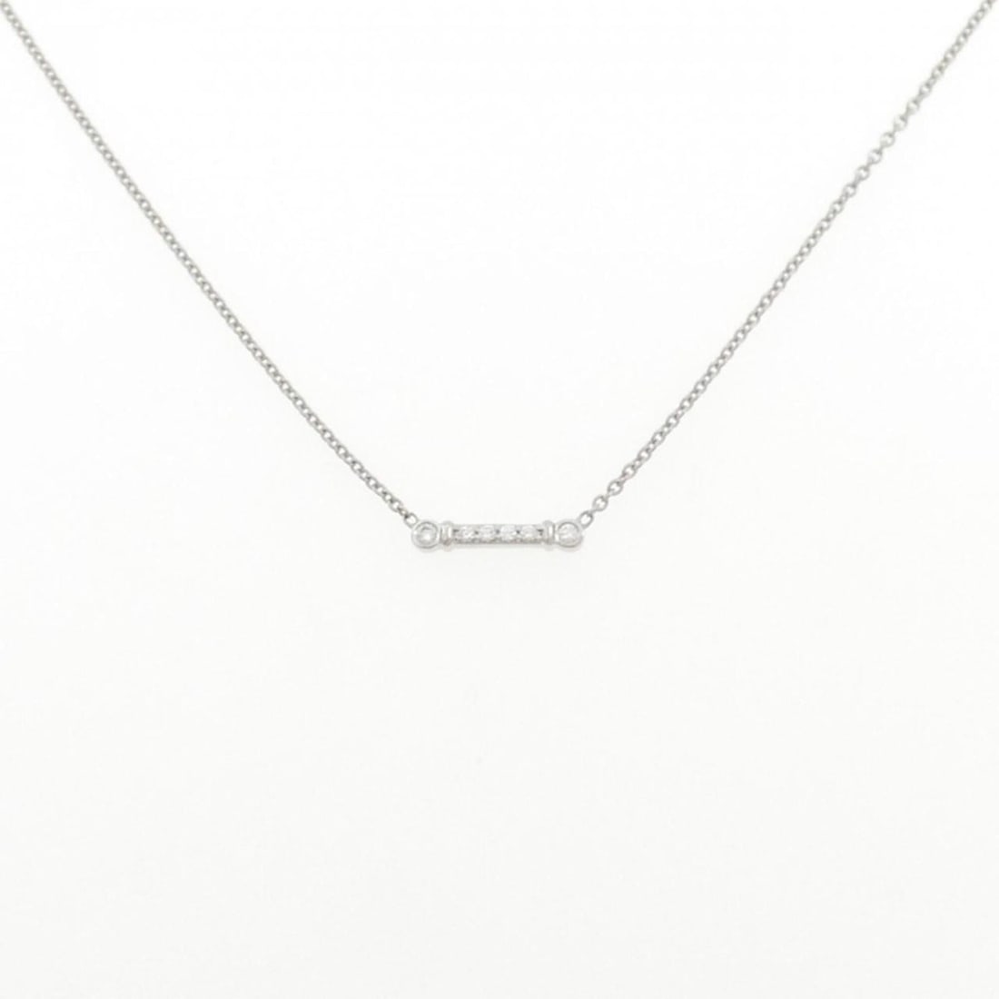 Tiffany & Co. Fleur de Lis Stem Necklace: --- Catalog ---Category: SizePendant Size: 2.3mm x 12.2mm / 0.09'' x 0.48''Neck Circumference: 40 cm / 15.74''Category: DesignStone: DiamondGender: WomenMaterial: Platinum 950Pendant Type: