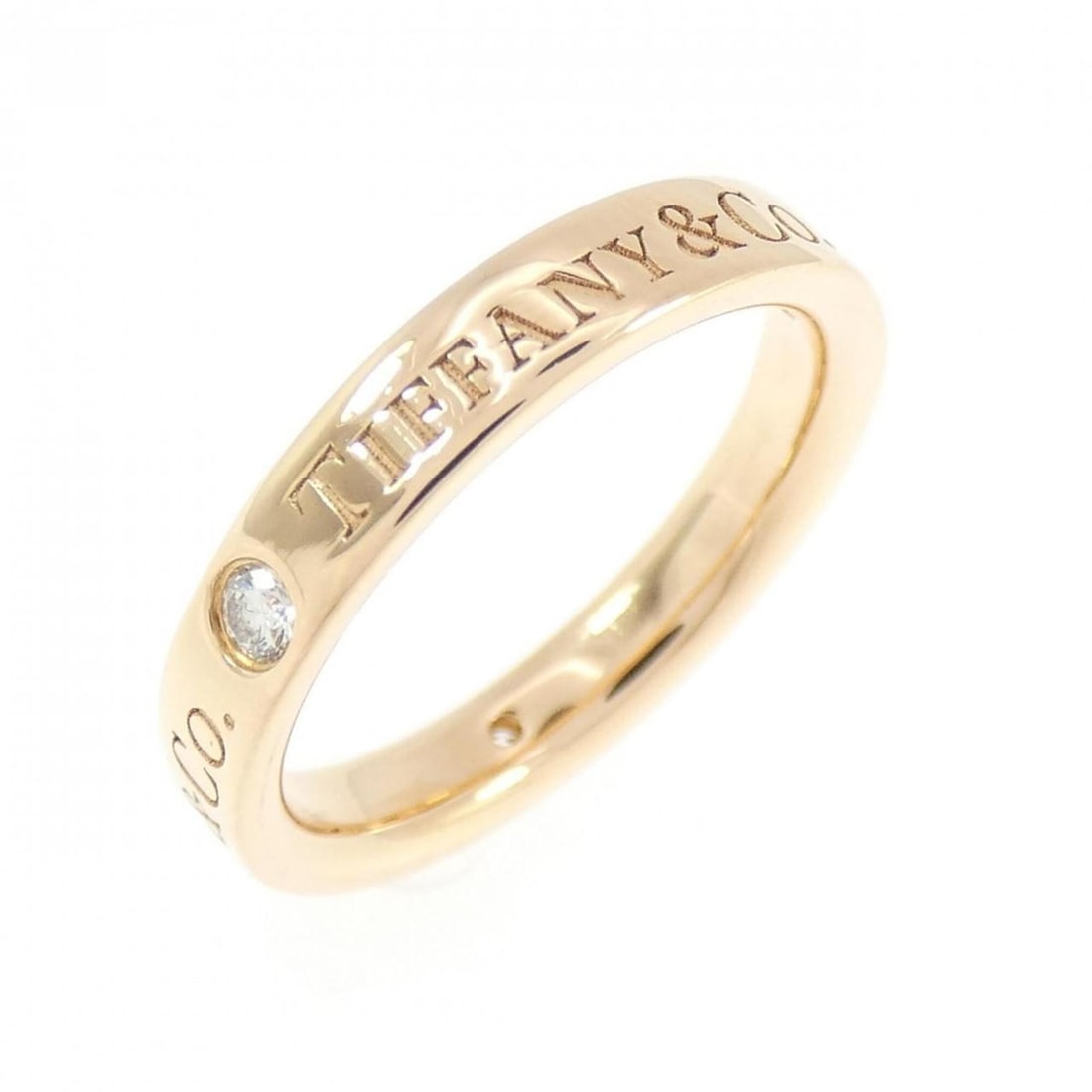 Tiffany Band Ring: --- Catalog ---Category: SizeJP Size: 5.0US Size: 3.5Category: DesignType: Band ringStone: DiamondGender: WomenMaterial: Pink gold (18K)Category: GeneralBrand: Tiffany--- Item List ---Section: