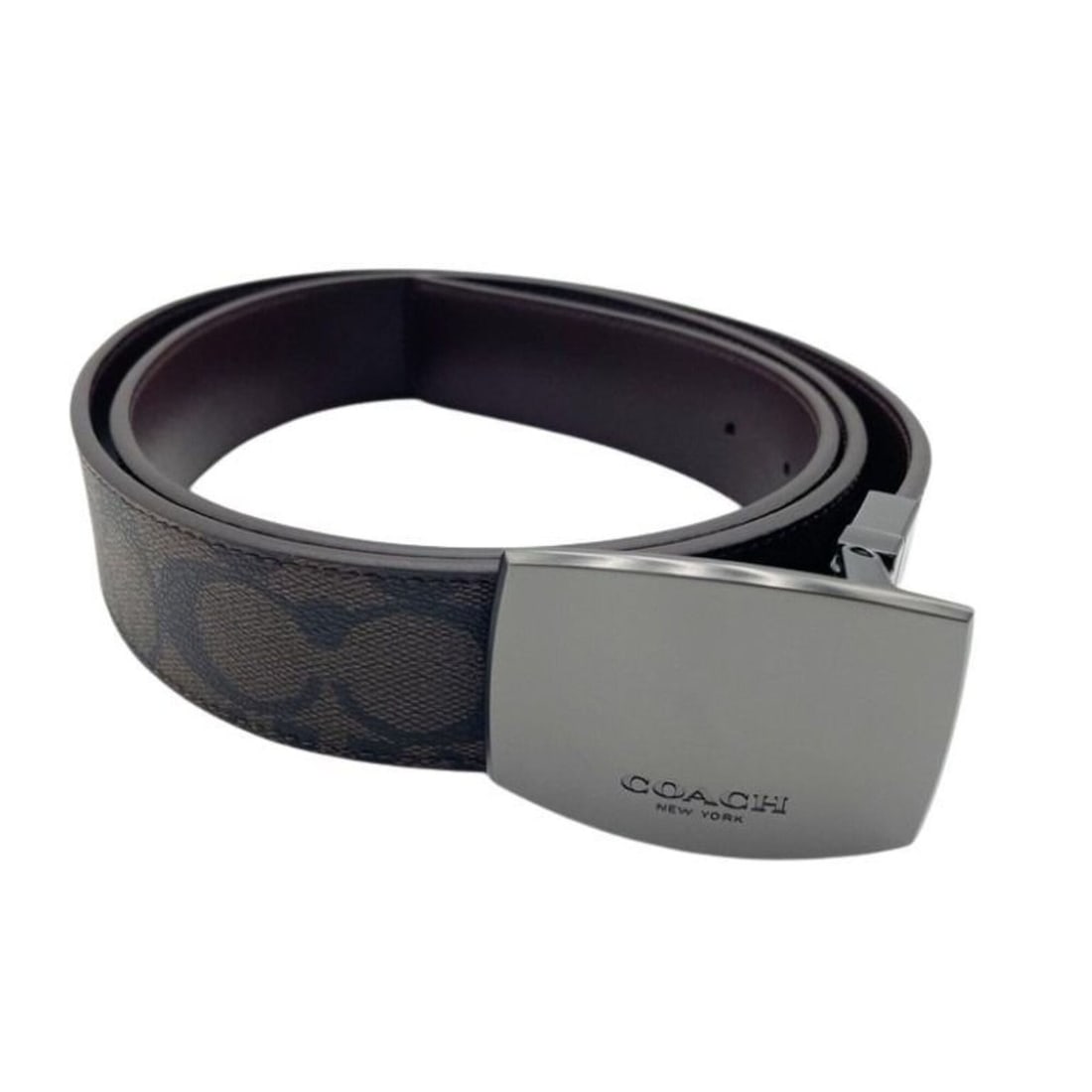 COACH Signature Reversible Belt F64839 Dark Brown PVC x Leather Men's: --- Catalog ---Category: SizeLength: 107cm - 117cm / 42.12'' - 46.06''Category: DesignType: Standard beltColor: Dark brownGender: MenMaterial (Strap): PVC , Leather Category: GeneralBrand: Coach---