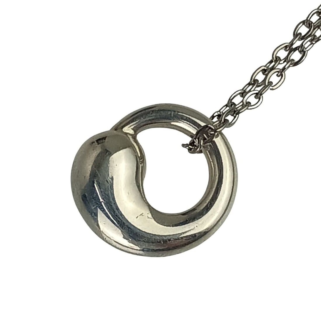 Tiffany & Co. Elsa Peretti Eternal Circle Necklace, Sterling Silver (SV925), Women's: --- Catalog ---Category: SizePendant Size: 1.3mm x 1.2mm / 0.05'' x 0.04''Neck Circumference: 46 cm / 18.11''Category: DesignColor: SilverGender: WomenMaterial: Silver 925Pendant Type: PendantNecklace