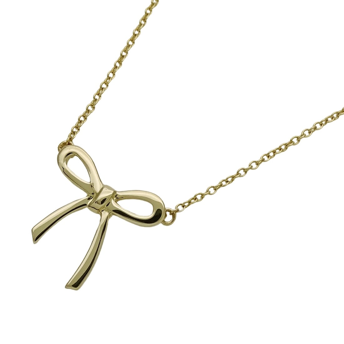 Tiffany & Co. Women's Necklace, 750YG Bow Ribbon Yellow Gold Jewelry: --- Catalog ---Category: SizePendant Size: 14.6mm x 14.4mm / 0.57'' x 0.56''Neck Circumference: 41 cm / 16.14''Category: DesignColor: YellowGender: WomenMaterial: Yellow gold (18K)Necklace Type: Neckl
