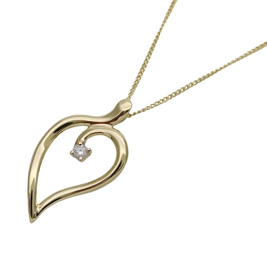 Tiffany & Co. Women's Necklace, 750YG, 1 Diamond, Open Leaf Heart Design, Yellow Gold Jewelry: --- Catalog ---Category: SizePendant Size: 26.2mm x 15.2mm / 1.03'' x 0.59''Neck Circumference: 46 cm / 18.11''Category: DesignColor: Yellow goldGender: Women,MenMaterial: Yellow gold (18K)Necklace Ty
