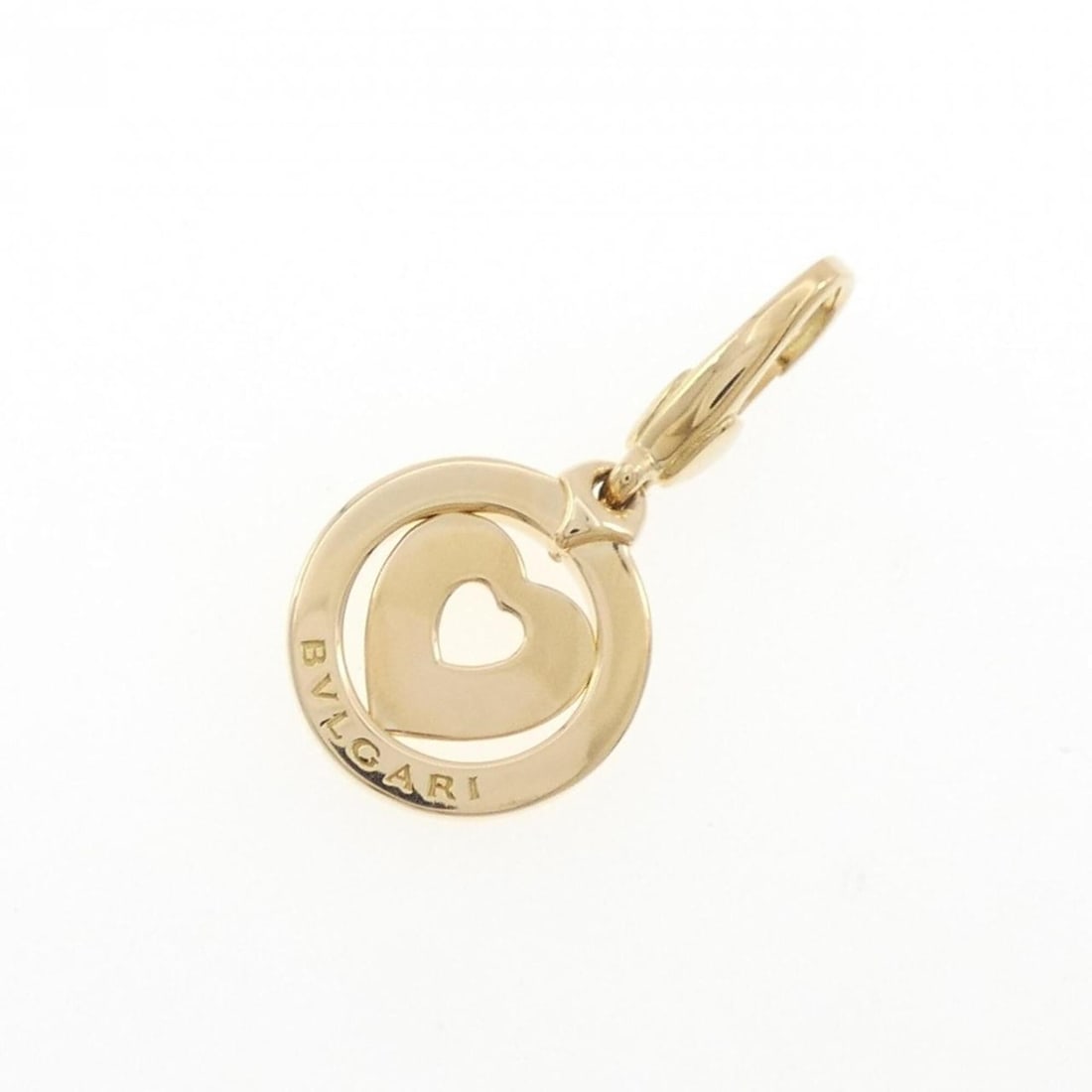 Bvlgari Tondo Heart Charm: --- Catalog ---Category: SizeSize (HxWxD): 29.30mm x 14.30mm / 1.15'' x 0.56''Category: DesignType: Necklace charmGender: WomenMaterial: Yellow gold (18K)Category: GeneralBrand: Bvlgari--- Item List