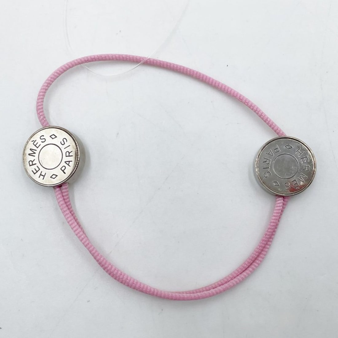 HERMES Bracelet, Sellier Cord Pink, Women's: --- Catalog ---Category: SizeLength: 25cm / 9.84''Category: DesignType: Charm braceletColor: PinkStyle: Casual, FashionGender: WomenCategory: GeneralBrand: Hermes--- Item List ---Section: