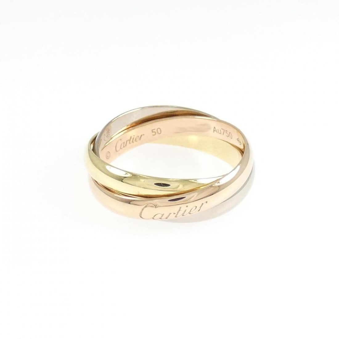 Cartier Trinity Ring: --- Catalog ---Category: SizeUS Size: 5.5Brand Size: 50Category: DesignType: Band ringGender: WomenMaterial: Pink gold (18K), White gold (18K), Yellow gold (18K)Category: GeneralMPN: B4086100Brand:
