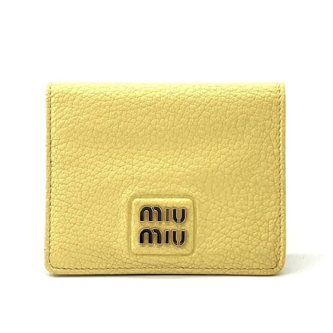 Miu Miu Miu Madras Leather Mini Wallet, Bi-fold Lemon Yellow: --- Catalog ---Category: SizeWeight: 70.4g / 2.48oz.Size (HxWxD): 9cm x 11.3cm x 1.1cm / 3.54'' x 4.44'' x 0.43''Category: DesignType: Wallet (bi-fold)Color: Lemon yellowGender: WomenMaterial: Leather