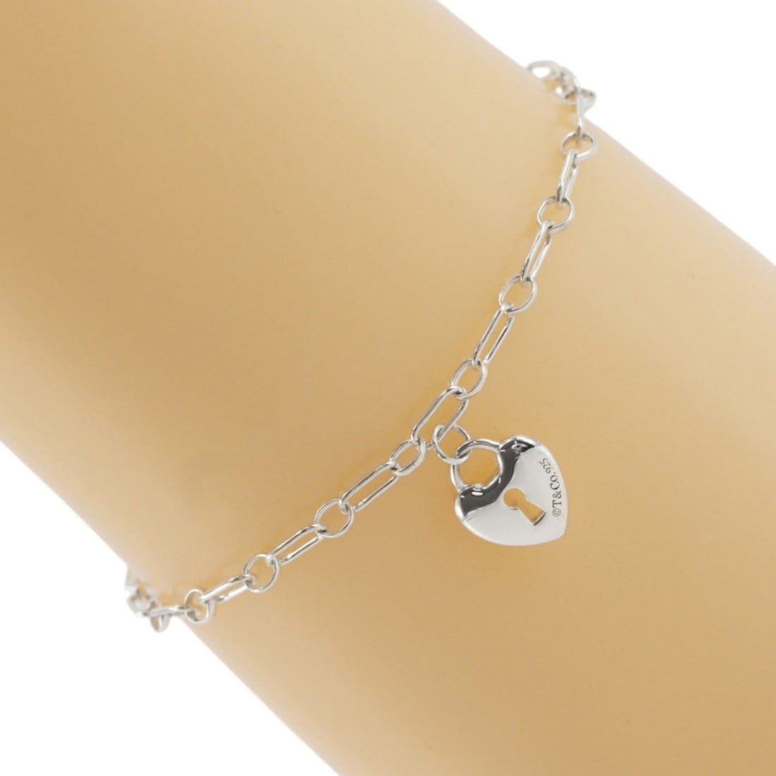 Tiffany & Co. Heart Lock Charm Bracelet, Sterling Silver 925, Approx. 2.8g, Unisex.: --- Catalog ---Category: SizeLength: 17.5cm / 6.88''Category: DesignType: Charm braceletGender: Men,WomenMaterial: Silver 925Category: GeneralBrand: Tiffany--- Item List ---Section: ConditionRanking: 