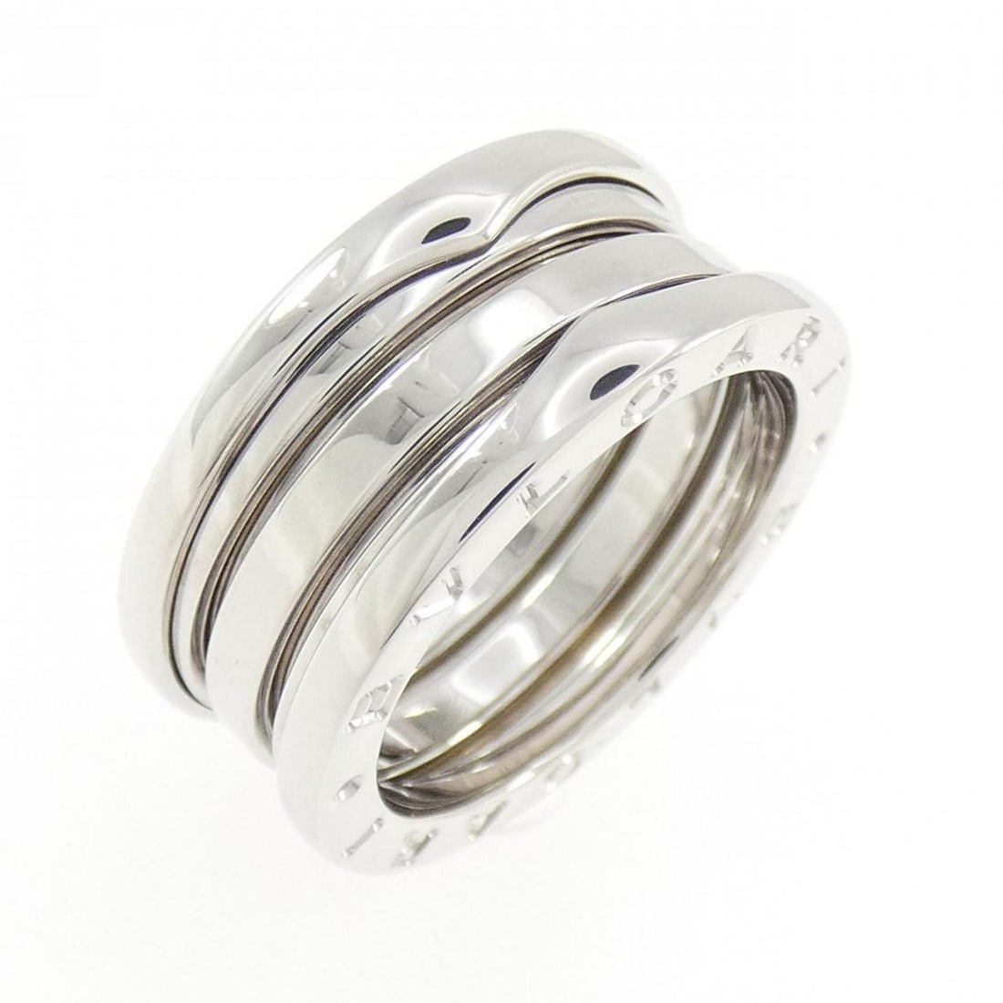 Bvlgari B.zero1 3-band ring: --- Catalog ---Category: SizeUS Size: 6.5Brand Size: 53Category: DesignType: Band ringGender: WomenMaterial: White gold (18K)Category: GeneralBrand: Bvlgari--- Item List ---Section: ConditionRanking: