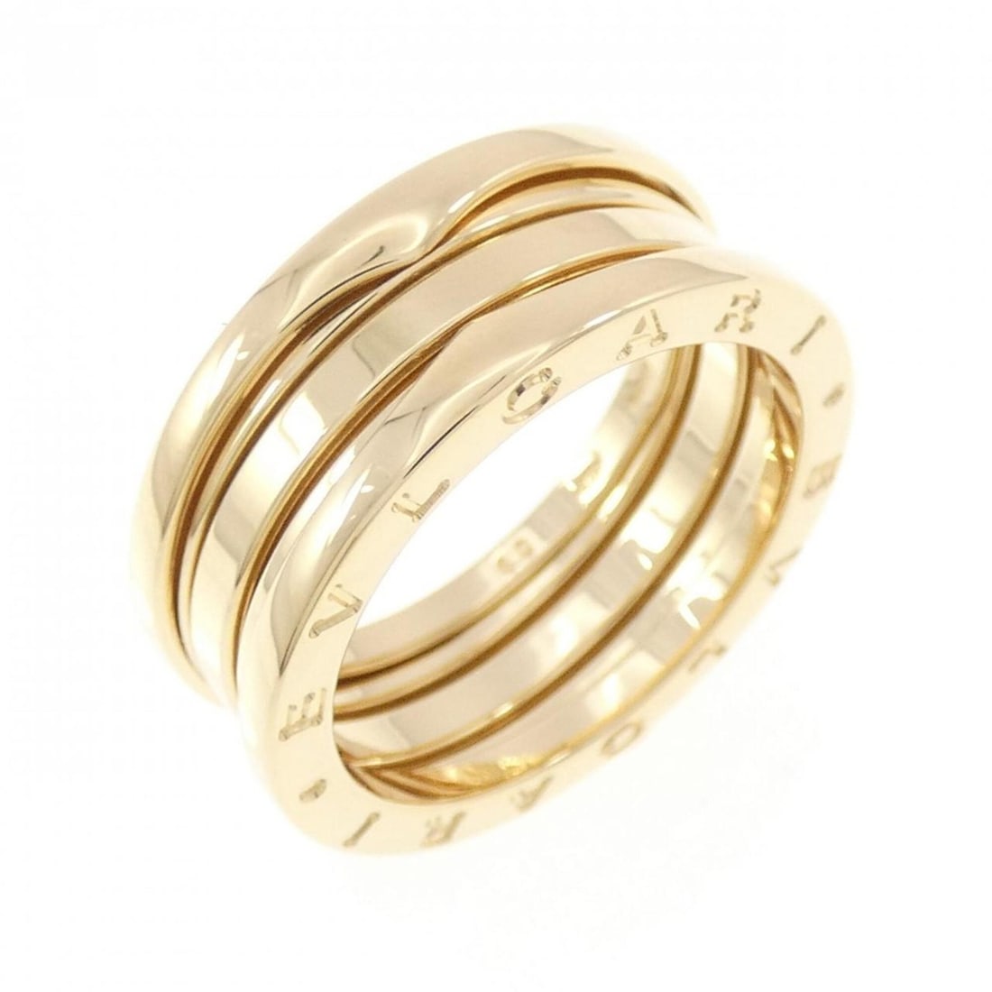Bvlgari B.zero1 3-band ring: --- Catalog ---Category: SizeUS Size: 10Brand Size: 60Category: DesignType: Band ringGender: Men,WomenMaterial: Yellow gold (18K)Category: GeneralMPN: AN191023Brand: Bvlgari--- Item List ---Section: C