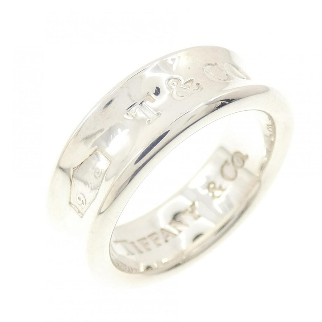 Tiffany 1837 Ring: --- Catalog ---Category: SizeJP Size: 11.0US Size: 6Category: DesignType: Band ringGender: WomenMaterial: Silver 925Category: GeneralBrand: Tiffany--- Item List ---Section: ConditionRanking: Rank B