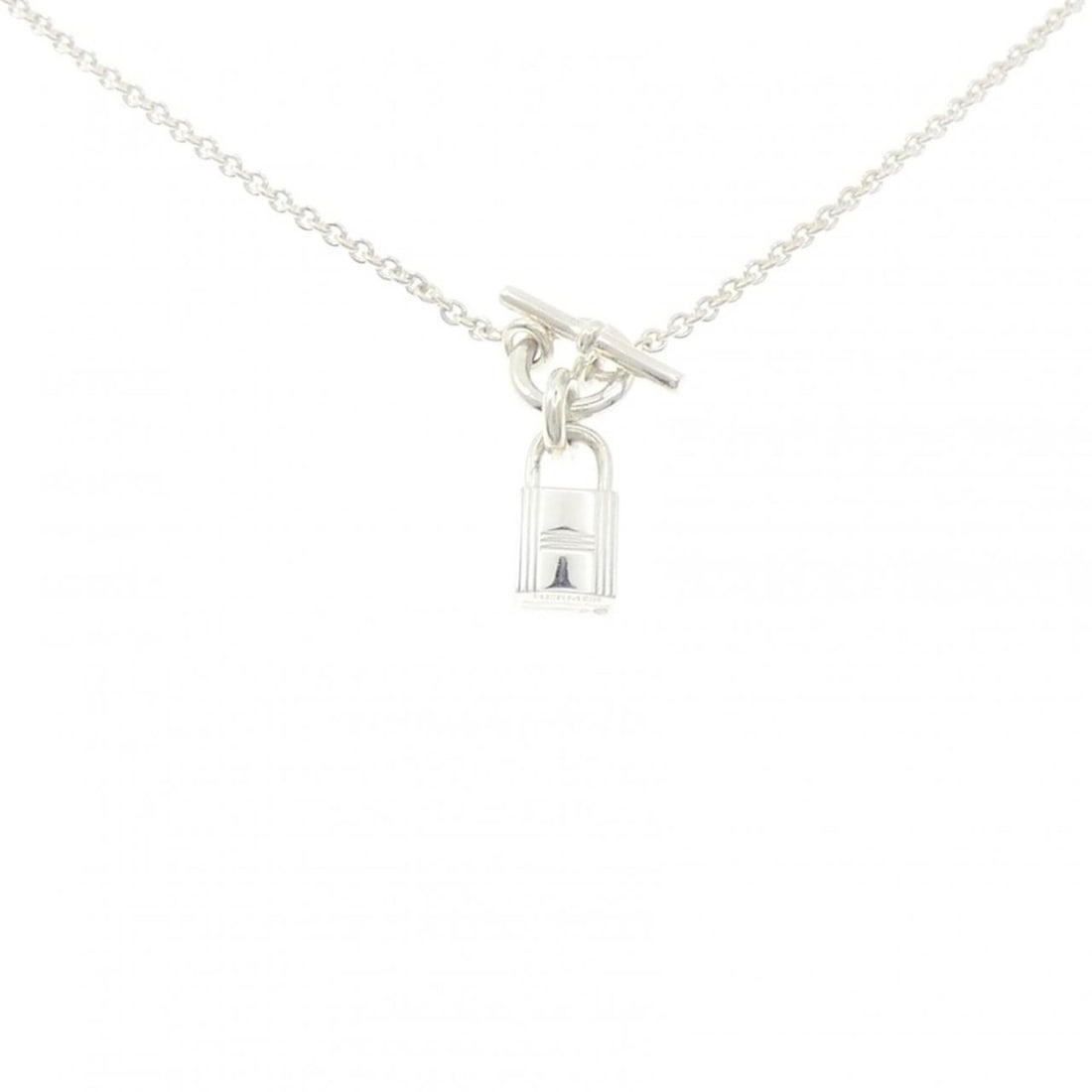 Hermes Amulette Cadena Necklace: --- Catalog ---Category: SizePendant Size: 28.4mm x 8.1mm / 1.11'' x 0.31''Neck Circumference: 41 cm / 16.14''Category: DesignGender: WomenMaterial: Silver 925Necklace Type: NecklaceCategory: GeneralM