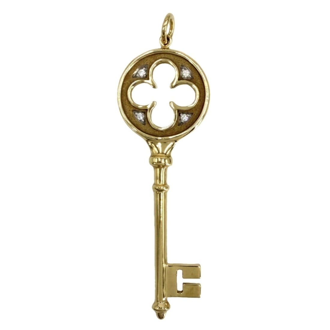 Tiffany & Co. Clover Key Charm Pendant Top for Women, 18K Yellow Gold, Diamond, Approx. 7.4g: --- Catalog ---Category: SizePendant Size: 50mm x 17mm / 1.96'' x 0.66''Category: DesignColor: Yellow goldGender: WomenMaterial: Yellow gold (18K)Pendant Type: PendantCategory: GeneralBrand: Tiffany--