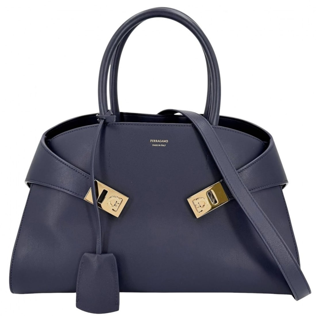 Salvatore Ferragamo Women's Hug Shoulder Tote Bag, Leather, Navy, Gold Hardware: --- Catalog ---Category: SizeSize (HxWxD): 17cm x 32cm x 18cm / 6.69'' x 12.59'' x 7.08''Category: DesignType: Tote bagColor: Navy, WhiteGender: WomenMaterial: Leather Category: GeneralBrand: Salvator