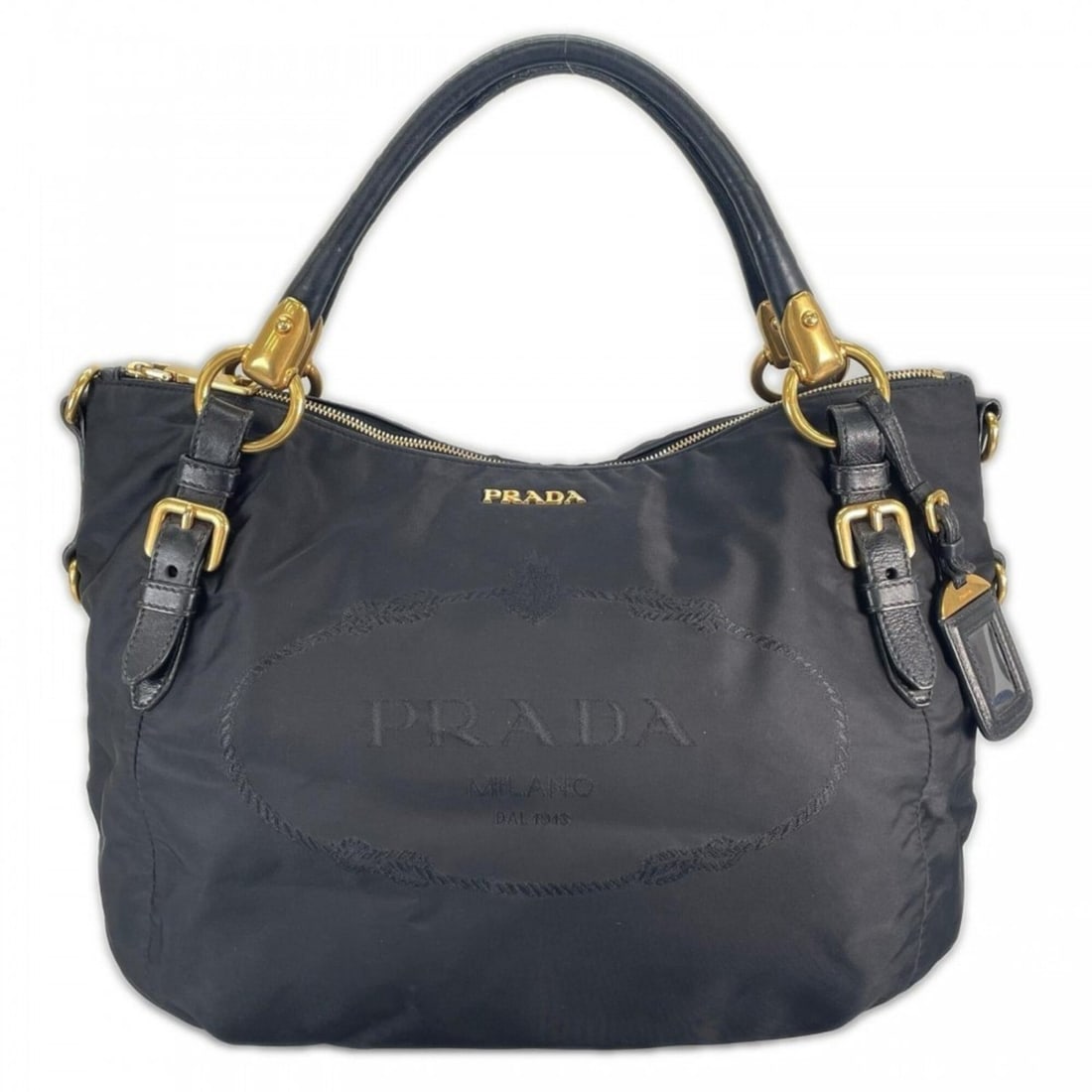 Prada handbag for women, nylon, black, gold hardware.: --- Catalog ---Category: SizeSize (HxWxD): 28cm x 33cm x 15cm / 11.02'' x 12.99'' x 5.9''Handle Length: 42cm / 16.53''Category: DesignType: HandbagColor: BlackGender: WomenMaterial: Nylon Category: Ge