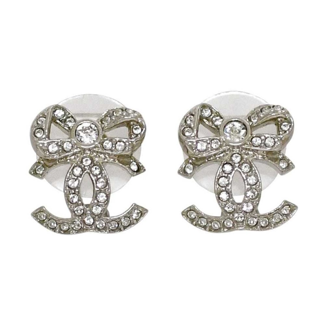 Chanel Earrings, Coco Mark Ribbon, A22 B, CHANEL, Metal, Rhinestone, Silver, Women's: --- Catalog ---Category: SizeSize (HxWxD): 14.50mm x 13.20mm / 0.57'' x 0.52''Category: DesignType: Drop earringsColor: SilverStone: RhinestoneGender: WomenMaterial: MetalCategory: GeneralBrand: Chane