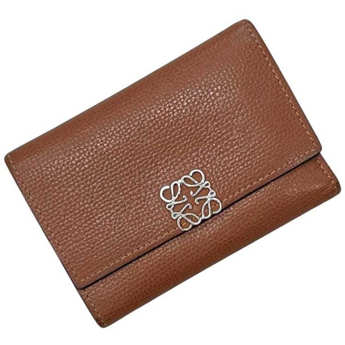 Loewe Tri-fold Wallet Anagram C821S33X01 2530 262231 LOEWE Leather TAN Brown Women's: --- Catalog ---Category: SizeSize (HxWxD): 8.5cm x 12cm x 2cm / 3.34'' x 4.72'' x 0.78''Category: DesignType: Wallet (tri-fold)Color: BrownGender: WomenClosure: Button, Snap fastenerMaterial: Leather 