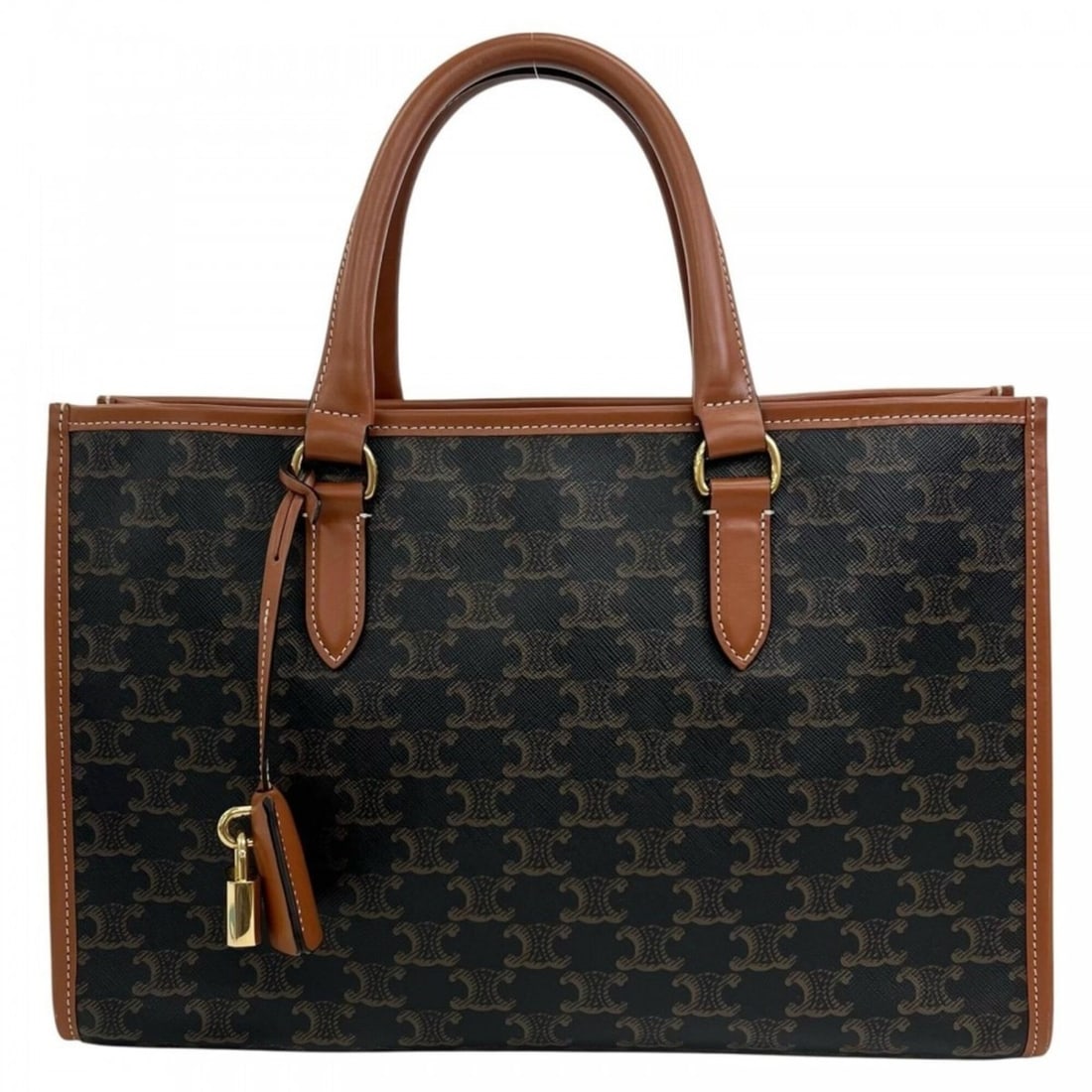 Celine Triomphe Tote Bag for Women, Brown Leather, Gold Hardware: --- Catalog ---Category: SizeSize (HxWxD): 24cm x 34.5cm x 12cm / 9.44'' x 13.58'' x 4.72''Handle Length: 47cm / 18.5''Category: DesignType: Tote bagColor: BrownGender: WomenMaterial: PVC , Leather Ca