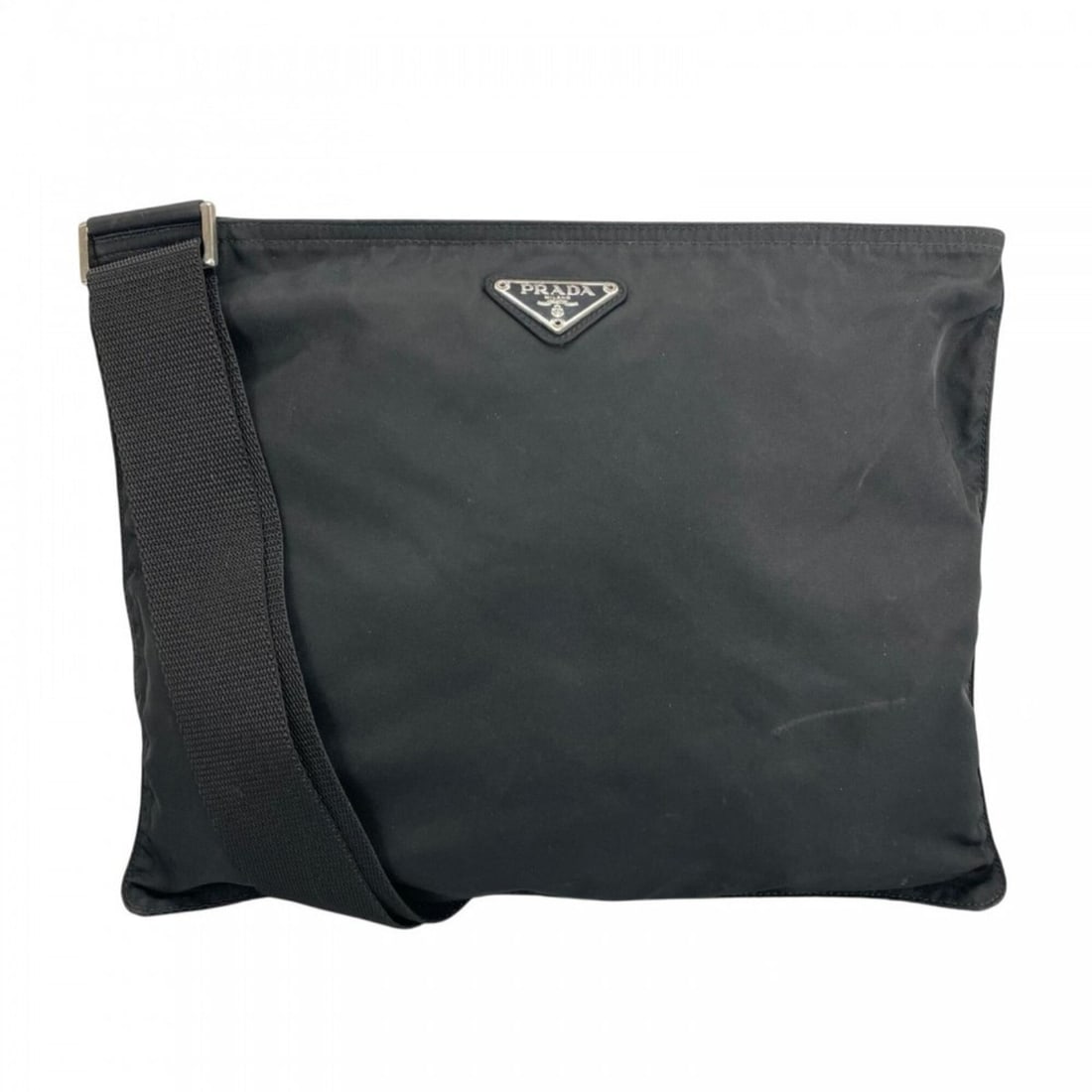 Prada shoulder bag for women, made of nylon, black with silver hardware.: --- Catalog ---Category: SizeSize (HxWxD): 25.5cm x 31cm / 10.03'' x 12.2''Strap Length: 130cm / 51.18''Category: DesignType: Shoulder bagColor: BlackGender: WomenMaterial: Nylon Category: GeneralBran