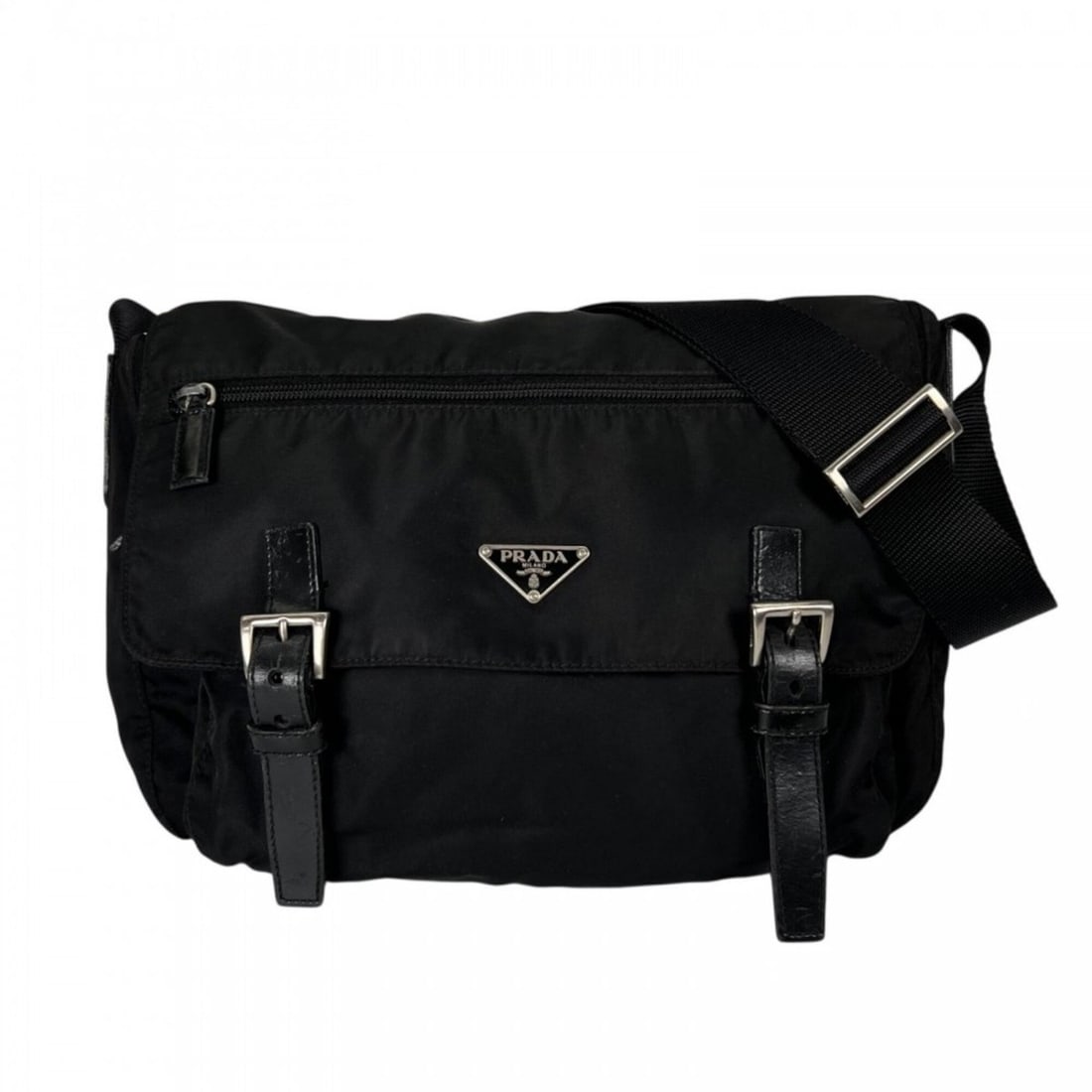 Prada shoulder bag for women, made of nylon, black with silver hardware.: --- Catalog ---Category: SizeSize (HxWxD): 20cm x 28cm x 12cm / 7.87'' x 11.02'' x 4.72''Strap Length: 136cm / 53.54''Category: DesignType: Shoulder bagColor: BlackGender: WomenMaterial: Nylon Categor