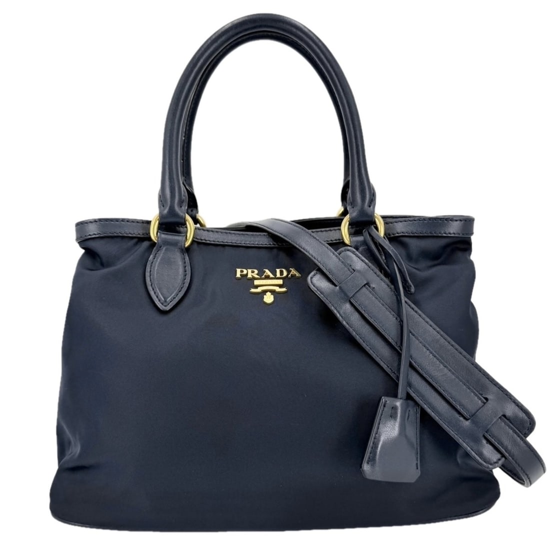 Prada women's shoulder bag/handbag, made of nylon and leather, navy blue with gold hardware. (1 of 14)