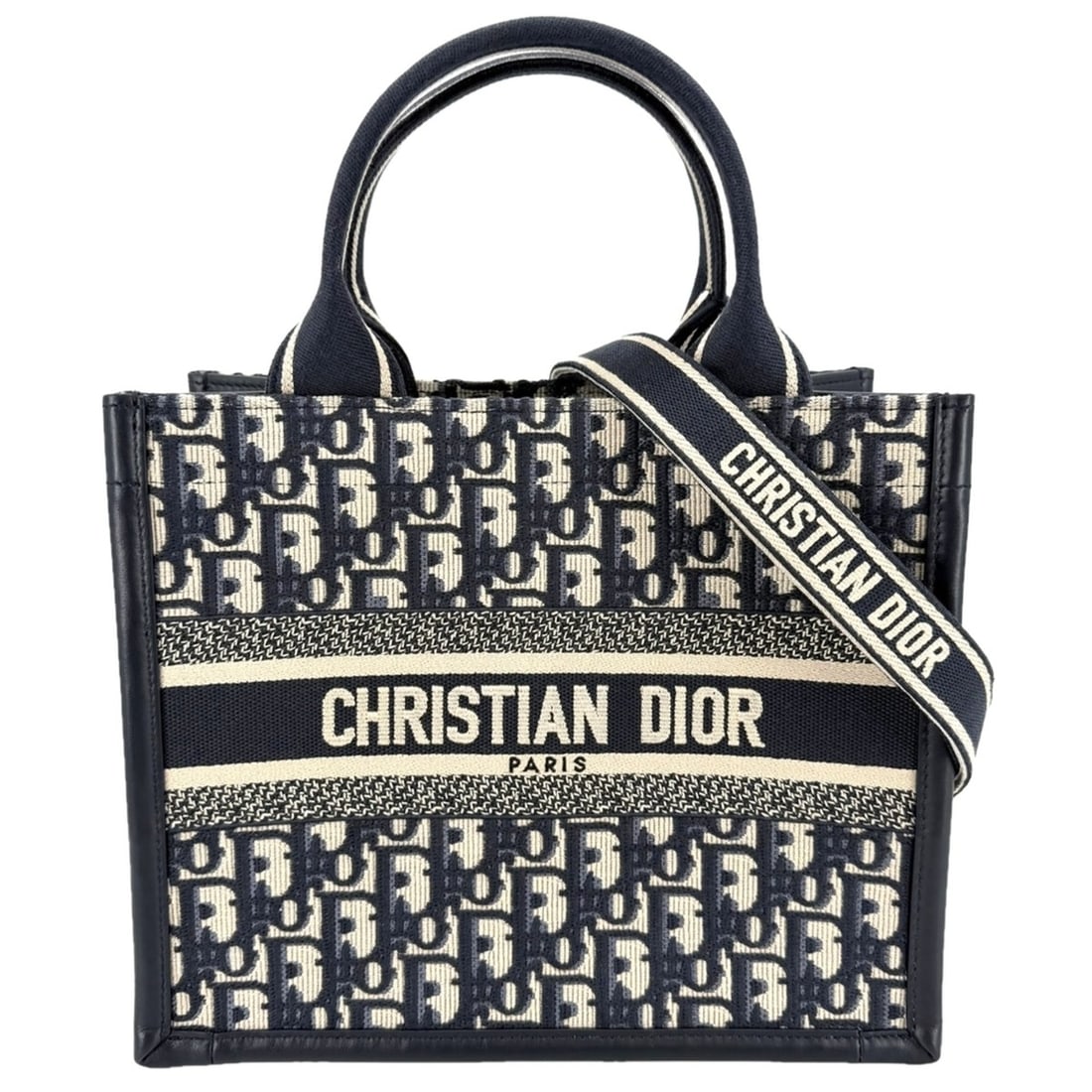 Christian Dior Women's Book Tote Oblique Shoulder Bag Cotton Canvas Calfskin Navy Beige: --- Catalog ---Category: SizeSize (HxWxD): 22cm x 26.5cm x 14cm / 8.66'' x 10.43'' x 5.51''Category: DesignType: Shoulder bag, Tote bagColor: Beige, NavyGender: WomenMaterial: Cotton canvas , Leather 