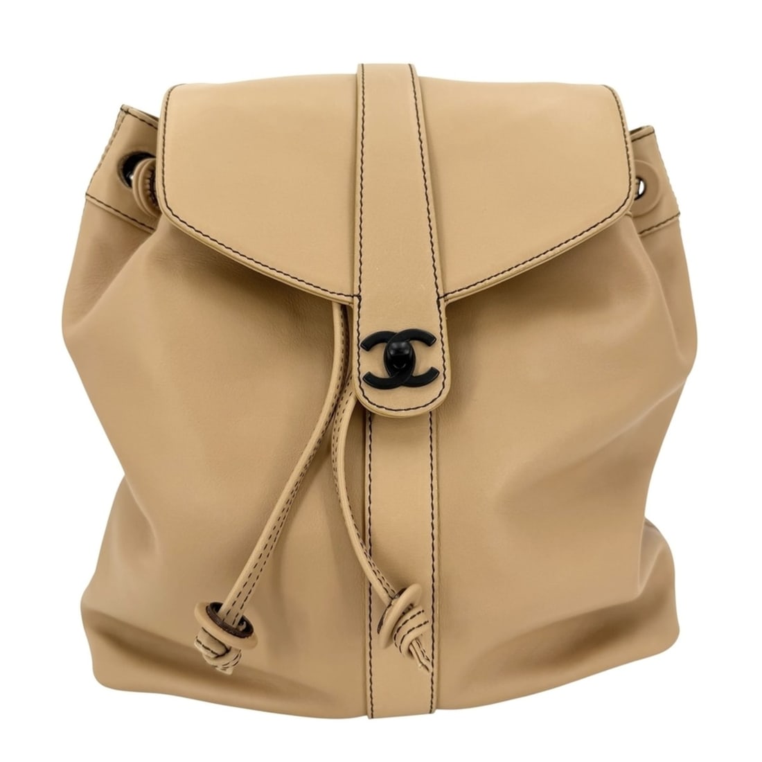 Chanel women's backpack with Coco Mark design, leather, brown, black hardware.