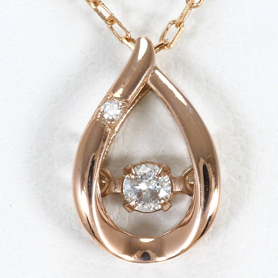 K10 10K Pink Gold Necklace with Diamonds (0.05ct and 0.005ct), Total Weight 0.8g, 41cm, Jewelry: --- Catalog ---Category: SizeWeight: 0.8g / 0.02oz.Pendant Size: 10mm x 6mm / 0.39'' x 0.23''Neck Circumference: 41 cm / 16.14''Category: DesignColor: Pink goldMetal: GoldStone: DiamondGender: WomenMa