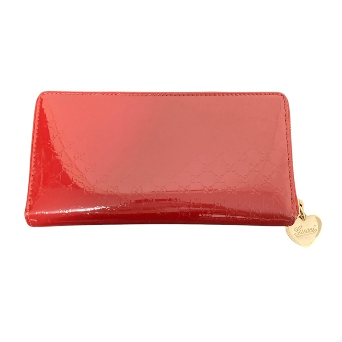 GUCCI Microguccissima Patent Leather Round Zip Long Wallet (308260, Red) - Women's: --- Catalog ---Category: SizeSize (HxWxD): 10.5cm x 20cm x 3cm / 4.13'' x 7.87'' x 1.18''Category: DesignType: Long wallet (bi-fold)Color: Red colorGender: WomenMaterial: Patent leather Category: Gene