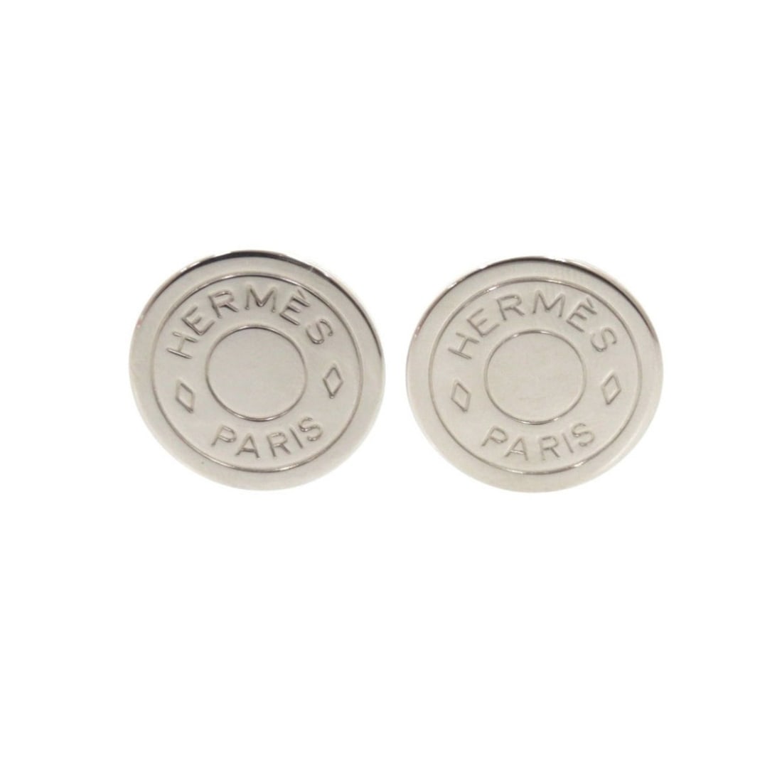Hermes Sellier Metal Silver Earrings 0223HERMES: --- Catalog ---Category: SizeSize (HxWxD): 20.00mm x 20.00mm / 0.79'' x 0.79''Category: DesignType: Clip earringsColor: SilverGender: WomenMaterial: MetalCategory: GeneralBrand: Hermes--- Item List --