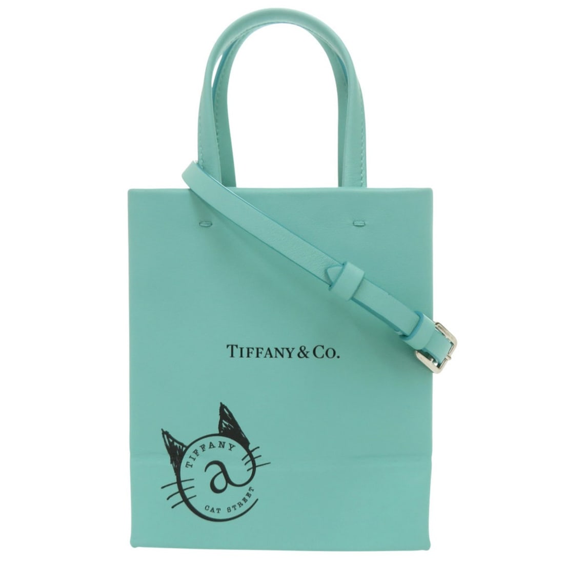 Tiffany & Co. Mini Shopping Tote Leather Handbag in Blue (Light Blue) 1558: --- Catalog ---Category: SizeSize (HxWxD): 15cm x 12.5cm x 7.5cm / 5.9'' x 4.92'' x 2.95''Category: DesignType: HandbagColor: Light blue, Tiffany blueGender: WomenMaterial: Leather Category: GeneralBr