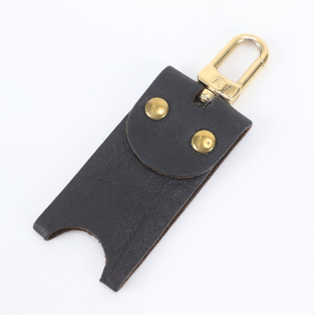 Louis Vuitton Leather Keychain Charm, Black, Brand Name, Men's: --- Catalog ---Category: SizeSize (HxWxD): 9cm x 3cm x 4.00mm / 3.54'' x 1.18'' x 0.15''Category: DesignType: KeyringColor: Black, GoldGender: MenMaterial: LeatherCategory: GeneralBrand: Louis Vuitton
