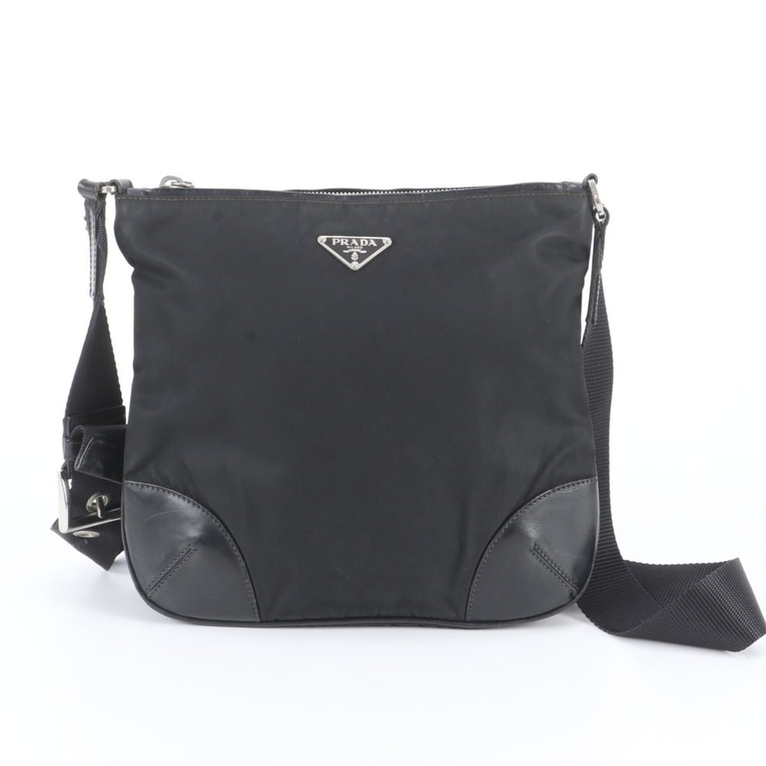 Prada Tessuto Nylon Triangle Logo Leather Shoulder Bag Messenger Black Men's: --- Catalog ---Category: SizeSize (HxWxD): 23cm x 23cm x 6cm / 9.05'' x 9.05'' x 2.36''Category: DesignType: Messenger bag, Shoulder bagColor: BlackGender: MenMaterial: Leather , Nylon Category: Gener