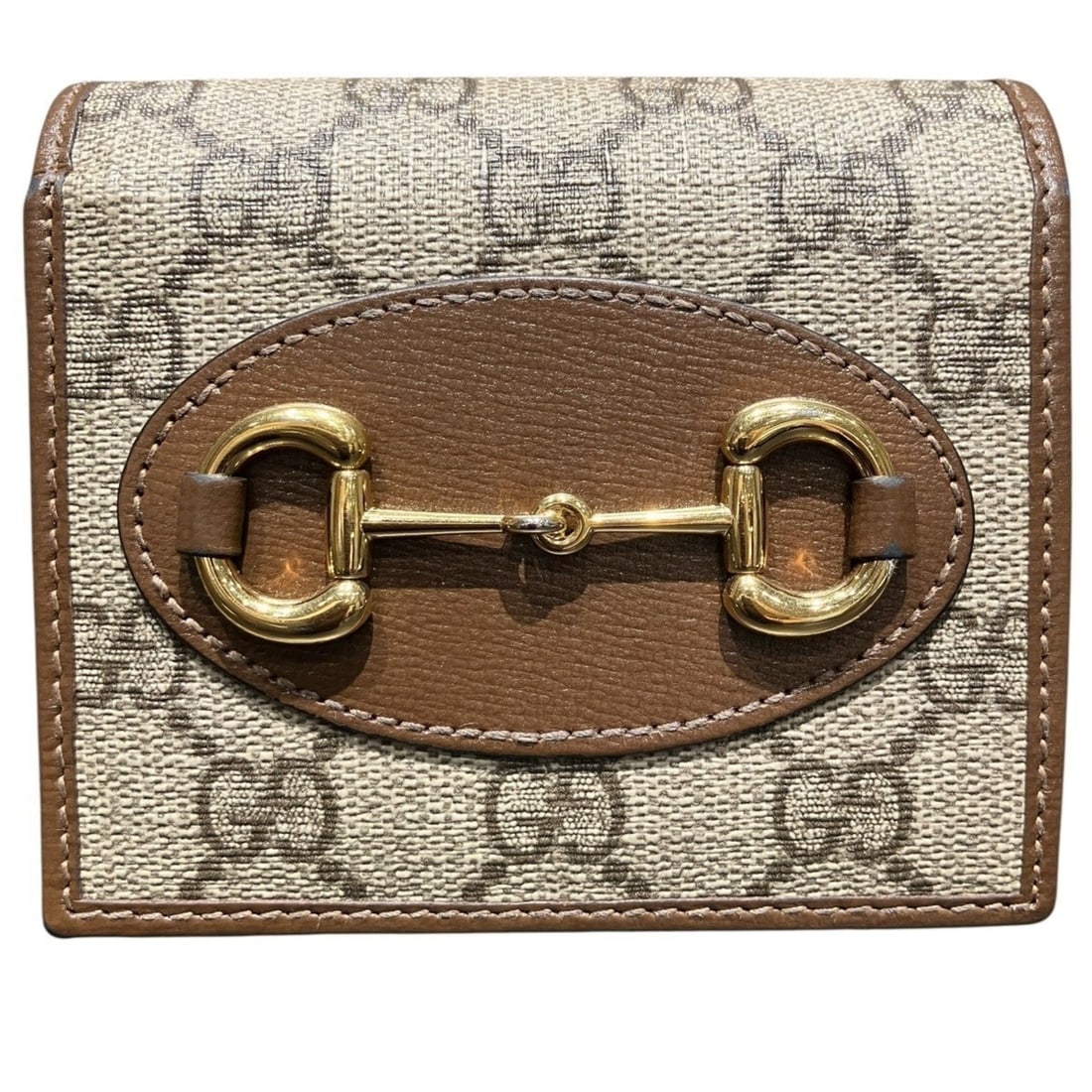 Gucci GUCCI Horsebit Bi-fold Wallet Leather 621891: --- Catalog ---Category: SizeSize (HxWxD): 10.5cm x 11cm x 3cm / 4.13'' x 4.33'' x 1.18''Category: DesignType: Wallet (bi-fold)Color: Beige, BrownGender: WomenMaterial: Leather , PVC Category: General