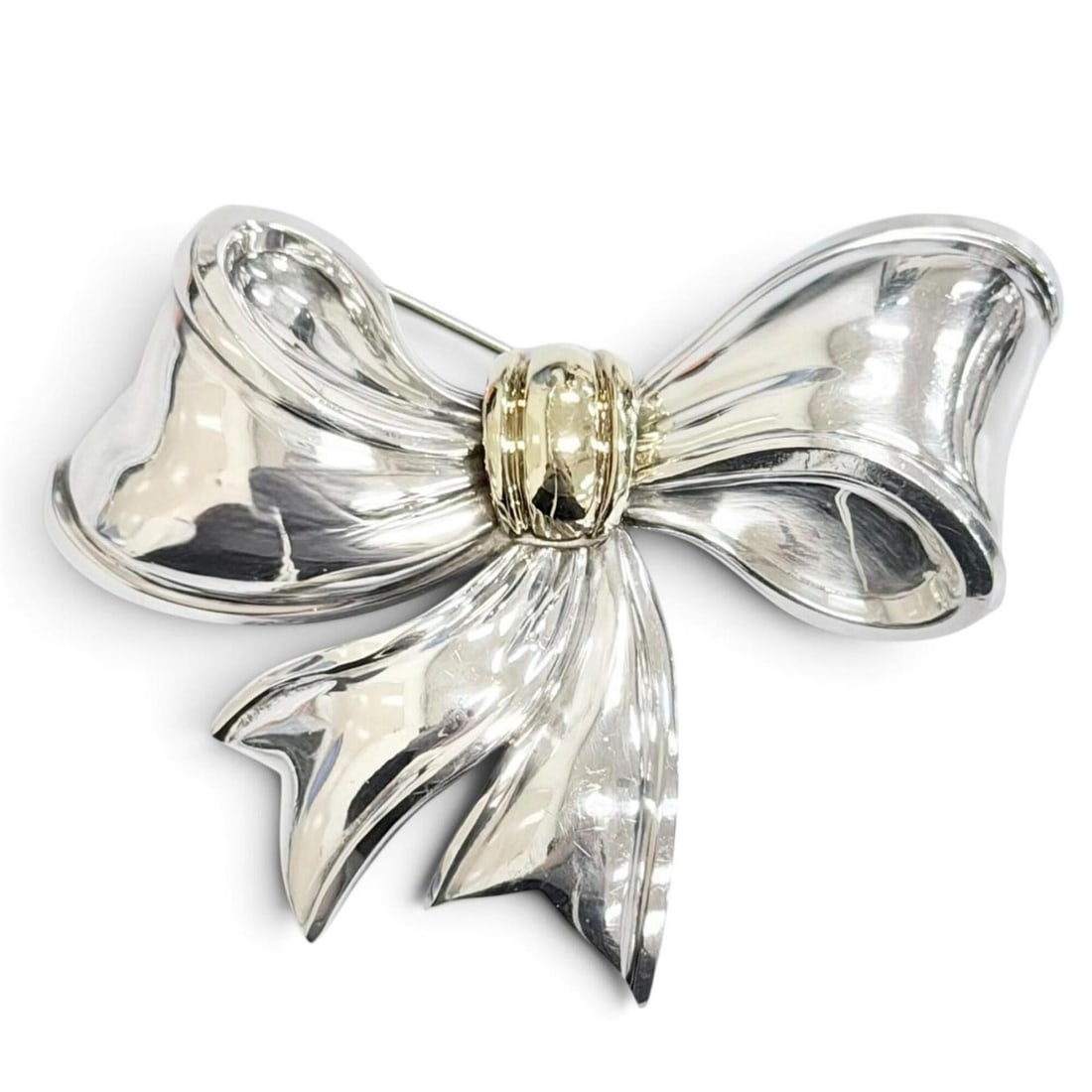TIFFANY&Co. Tiffany Vintage 925 18K Ribbon Brooch, Silver and Gold, Weight 30.6g, Women's.: --- Catalog ---Category: SizeSize (HxWxD): 7cm x 7.5cm / 2.75'' x 2.95''Category: DesignType: BroochColor: Gold, SilverGender: WomenMaterial: Gold (18K), Silver 925Category: GeneralBrand: Tiffany--- I