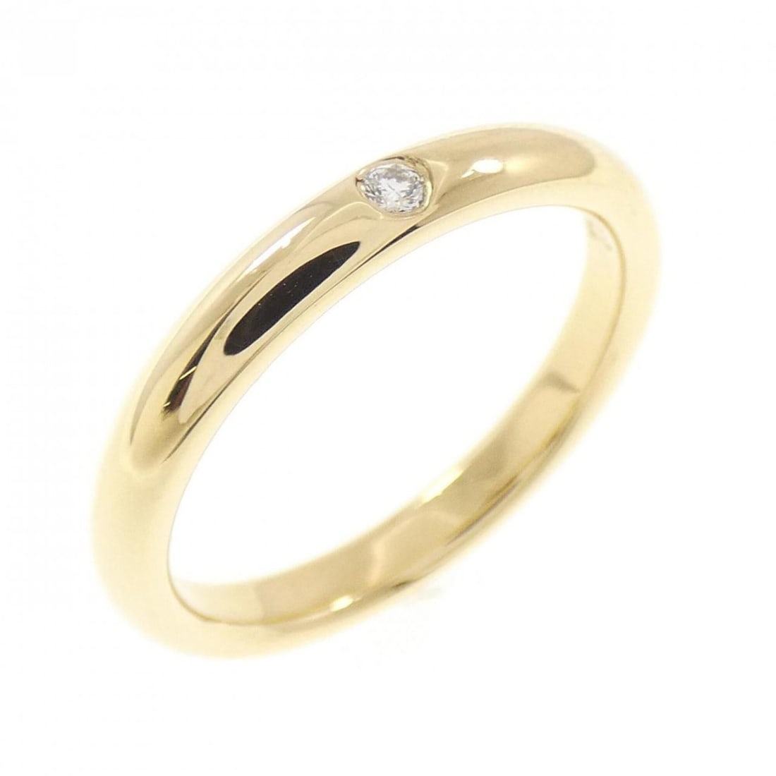 Tiffany Band Ring: --- Catalog ---Category: SizeJP Size: 11.5US Size: 6Category: DesignType: Band ringStone: DiamondGender: WomenMaterial: Yellow gold (18K)Category: GeneralBrand: Tiffany--- Item List ---Section: Condit