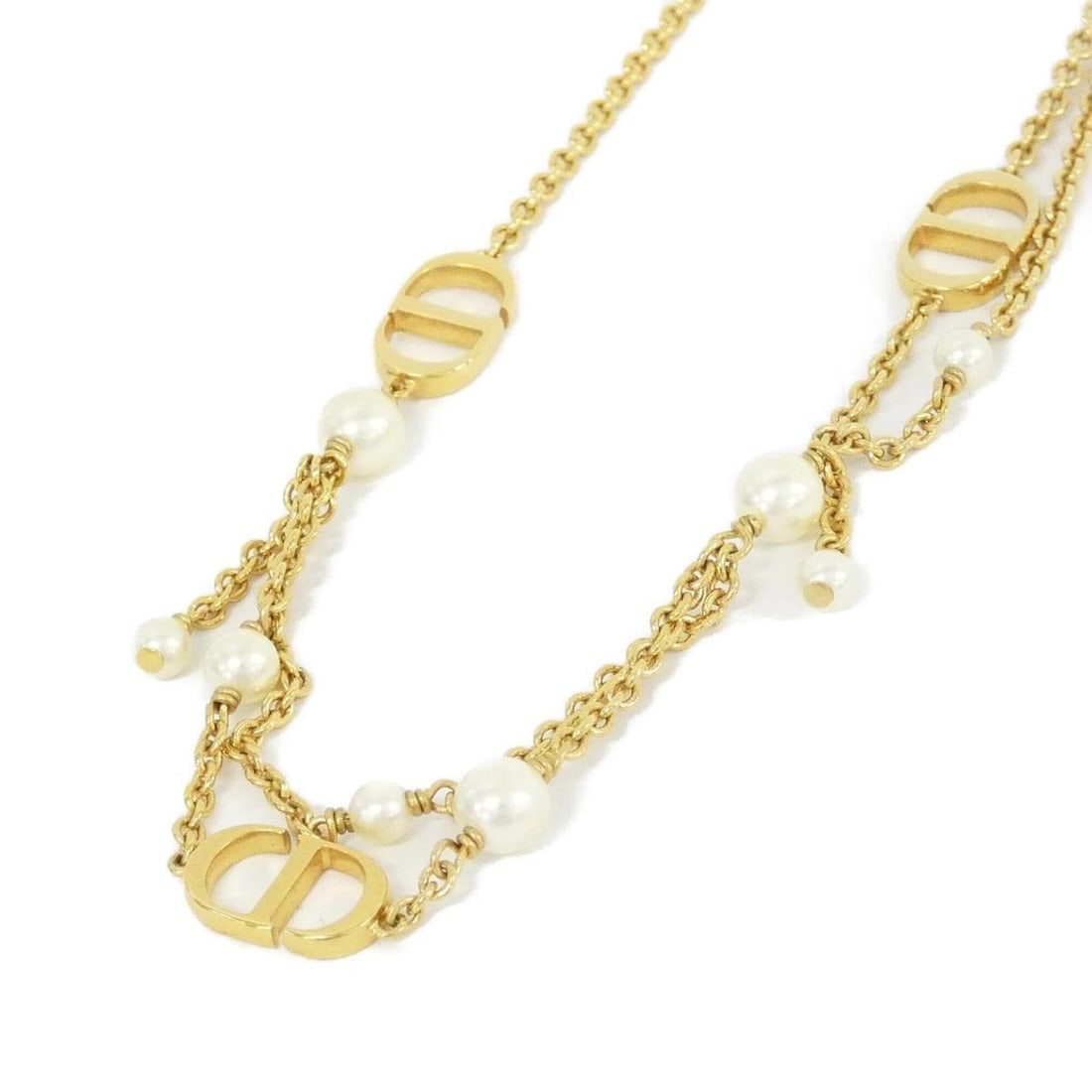 Christian Dior Petite CD N2324WOMRS Necklace: --- Catalog ---Category: SizePendant Size: 1mm x 1.3mm / 0.03'' x 0.05''Neck Circumference: 41 cm / 16.14''Category: DesignColor: Gold, WhiteGender: WomenNecklace Type: NecklaceCategory: GeneralBrand: