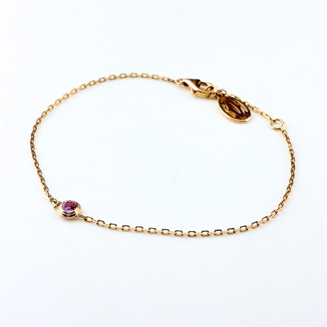 Cartier d'Amour Pink Sapphire Bracelet 750 Gold for Women: --- Catalog ---Category: SizeLength: 18cm / 7.08''Category: DesignType: Charm braceletStone: SapphireGender: WomenMaterial: Pink gold (18K)Category: GeneralBrand: Cartier--- Item List ---Section: Cond
