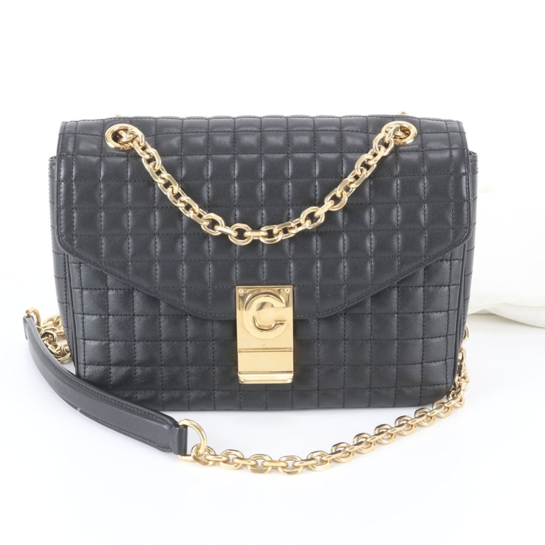 Celine C Medium Quilted Leather 2-Way Chain Shoulder Bag for Women: --- Catalog ---Category: SizeSize (HxWxD): 16cm x 21cm x 8cm / 6.29'' x 8.26'' x 3.14''Category: DesignType: Shoulder bagColor: BlackGender: WomenMaterial: Leather Category: GeneralBrand: CelineCountr