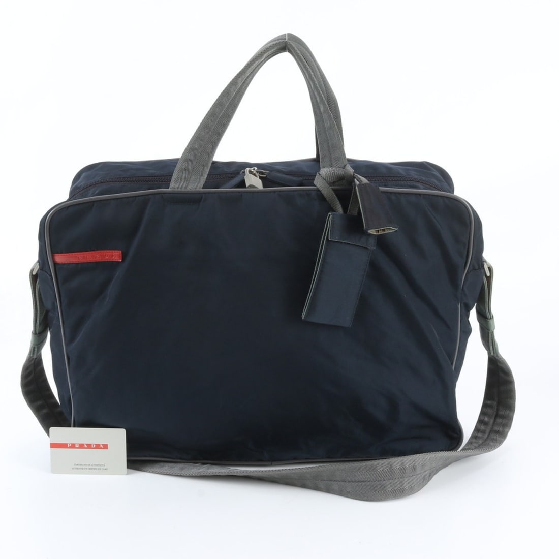Pradasports Prada Sport V369 2-Way Boston Bag/Tote Bag/Shoulder Bag for Men (with Guarantee): --- Catalog ---Category: SizeSize (HxWxD): 30cm x 44cm x 15cm / 11.81'' x 17.32'' x 5.9''Category: DesignType: Boston bag, Shoulder bag, Tote bagColor: Gray, NavyGender: MenCategory: GeneralMPN: V369B