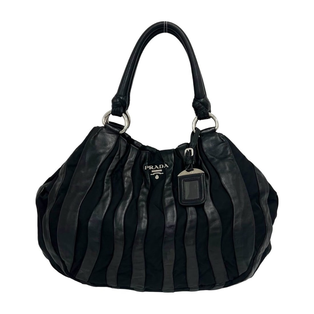 PRADA Prada Logo Hardware Leather Genuine Tessuto Pocono Nylon Tote Bag Handbag Black 20222: --- Catalog ---Category: SizeSize (HxWxD): 28cm x 48cm x 10cm / 11.02'' x 18.89'' x 3.93''Category: DesignType: Handbag, Tote bagColor: BlackGender: WomenMaterial: Leather , Nylon Category: GeneralBra