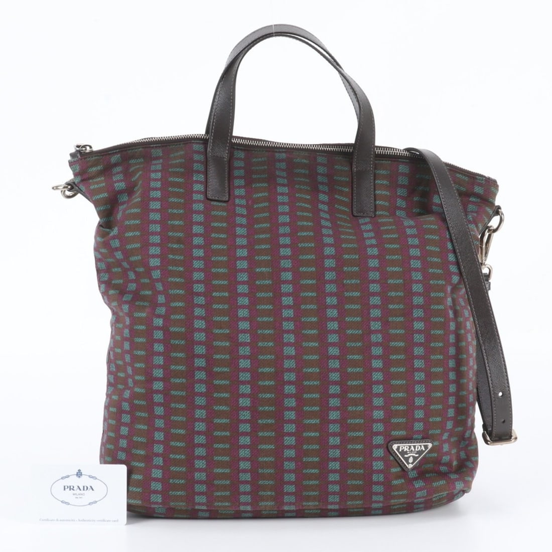 Prada B2052G Leather 2-Way Shoulder Bag/Tote Bag for Men (with Guarantee Card): --- Catalog ---Category: SizeSize (HxWxD): 34cm x 32cm x 14cm / 13.38'' x 12.59'' x 5.51''Category: DesignType: Shoulder bag, Tote bagColor: Blue, Brown, PurpleGender: MenMaterial: Leather , Canvas Ca