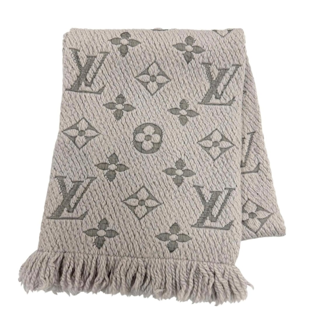 LOUIS VUITTON M74742 Echarpe Logomania Wool Silk Gris Perle Stole Scarf, Made in Italy, Authentic,: --- Catalog ---Category: SizeSize (LxW): 1.4m x 28cm / 55.11'' x 11.02''Category: DesignType: StoleGender: WomenMaterial: Wool , Silk Category: GeneralMPN: M74742Brand: Louis VuittonCountry of Origin: