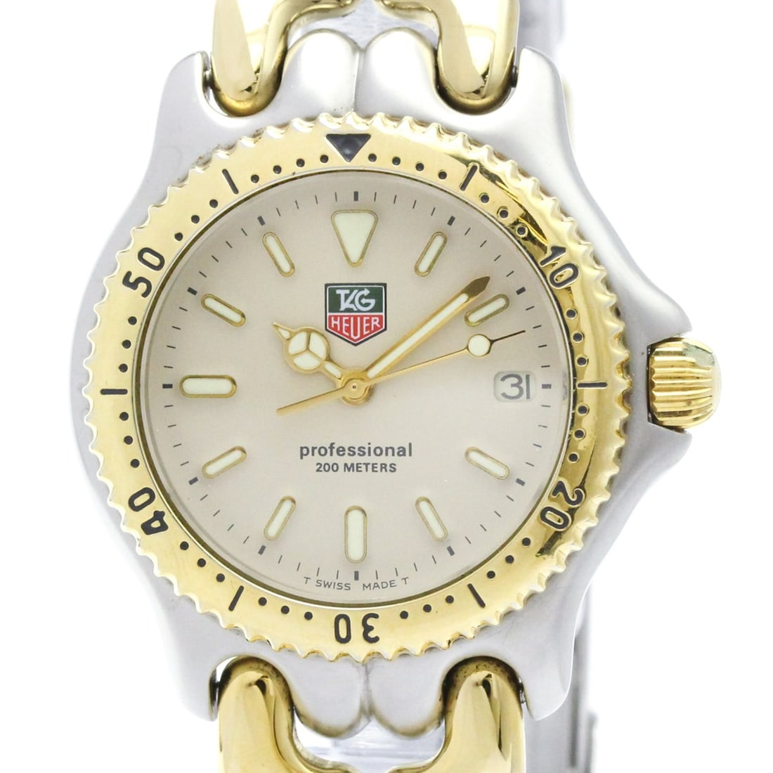 TAG HEUER Sel 200M Gold Plated Steel Mid Size Watch S95.713: --- Catalog ---Category: SizeCase Diameter: 34mm / 1.34''Category: DesignType: WristwatchStyle: Dress/FormalGender: MenColor (Dial): IvoryMaterial (Band): Gold plated, Stainless steelMaterial (Case): 