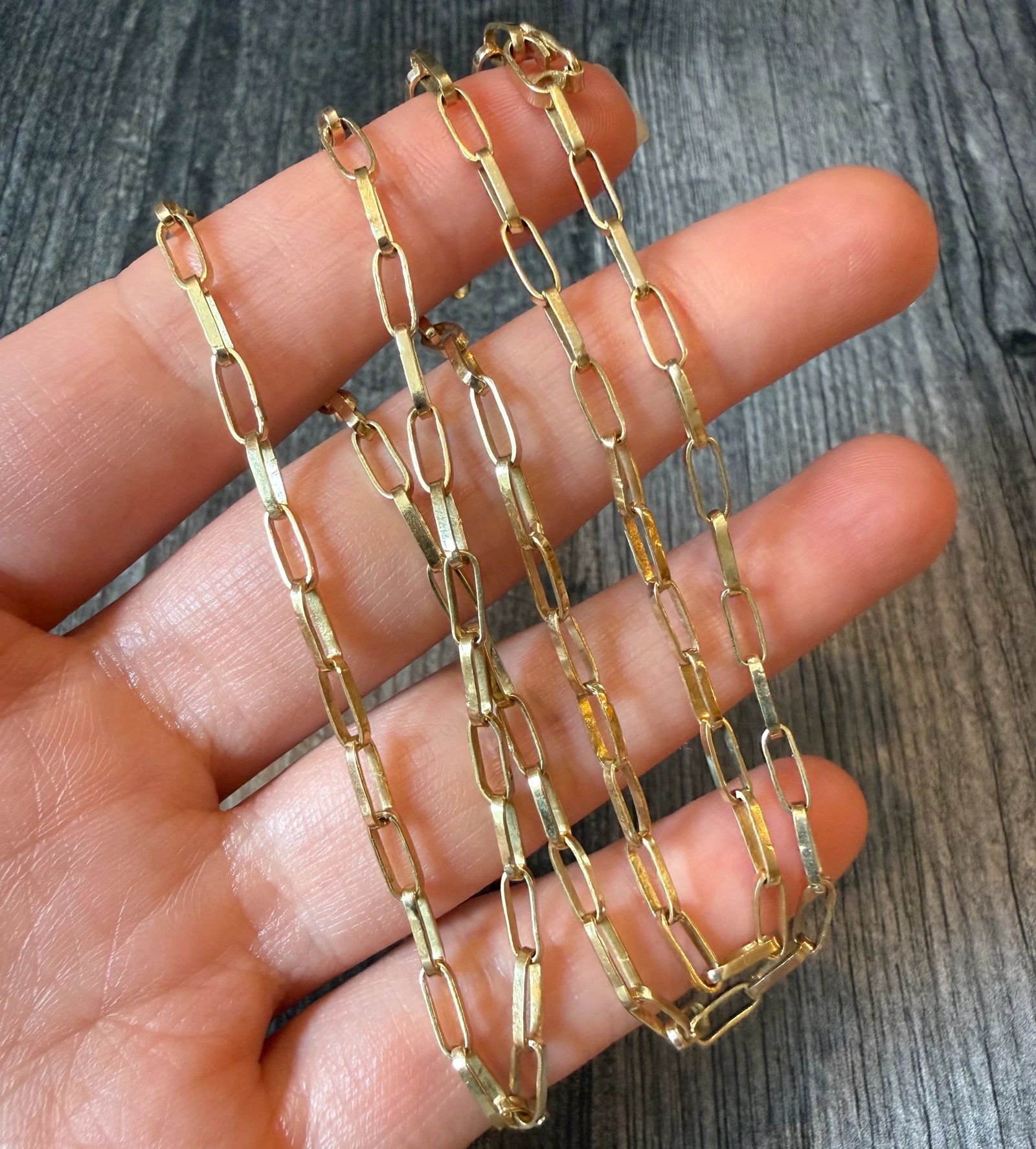 Paperclip Chain in 18K Gold, 24?? Long (I): Metal: 18K Yellow Gold (acid tested)Weight: 12 gramsMeasurements: 24 inches long by 2.8 mm wide Condition: In fair condition with some dings in a few links as well as minor surface wear throughout